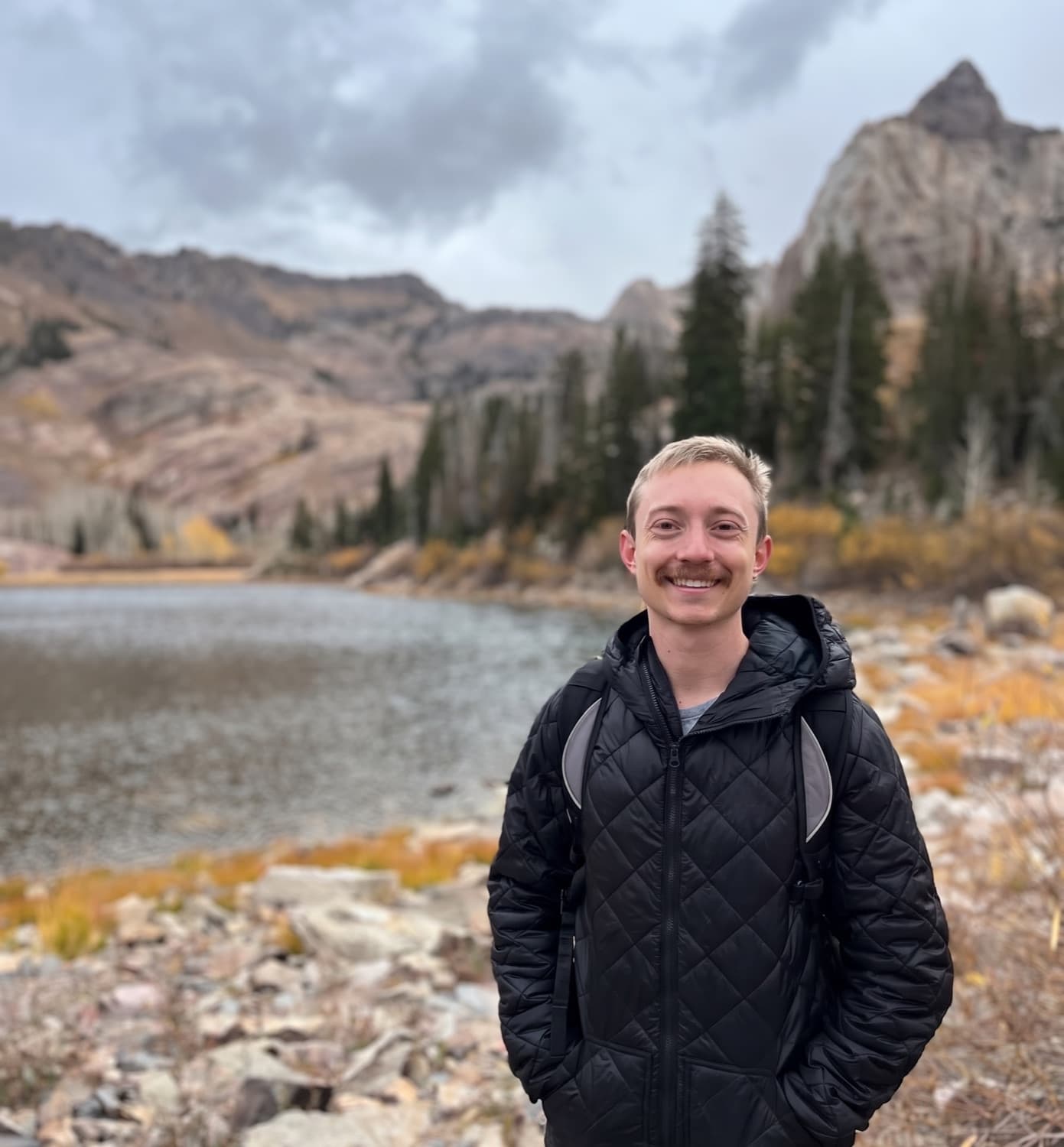 Hunter Rowe, founder of Pivot Solar, at a mountain lake in Colorado